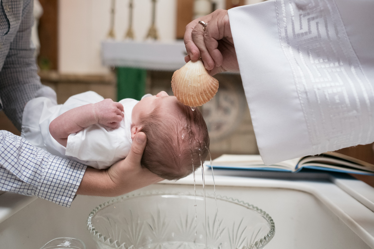 Baby being baptised