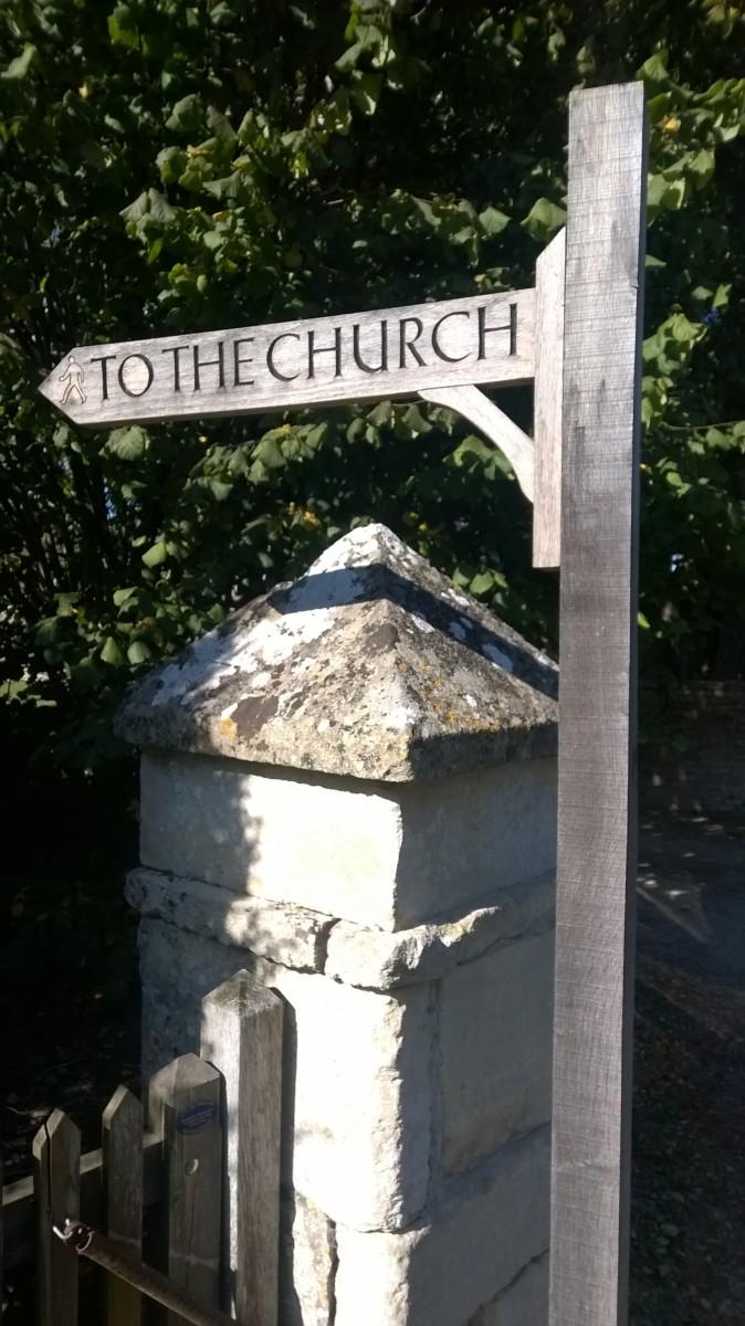 Photo of finger post with the words 'To the Church'