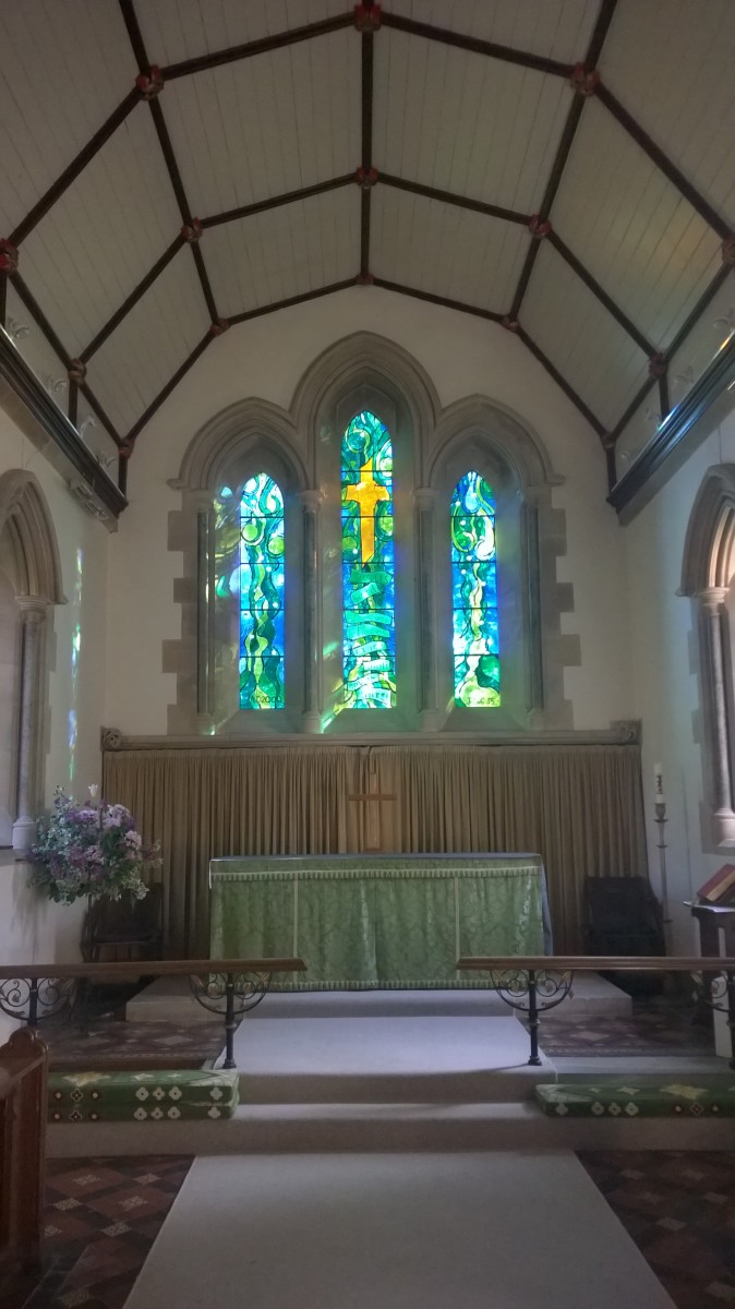 Photo of the Millenium window and altar in All Saint's Kemble