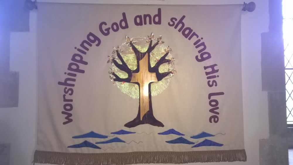 Photo of Banner 'Worshipping God and sharing His love' All Saints Kemble