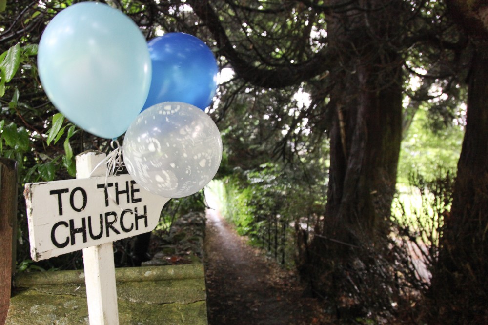 Photo of Finger post with the words 'To the Church'.